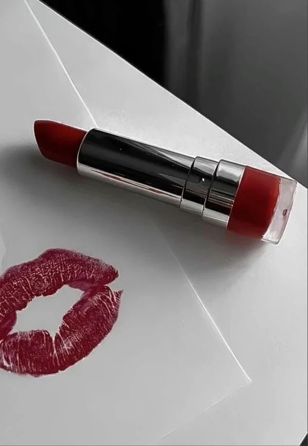 Red lipstick and a kiss print